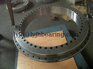 China YRT650 bearing 650x870x122mm,brass cage,three row roller,GCr15SiMn material,58-62 Hardness supplier