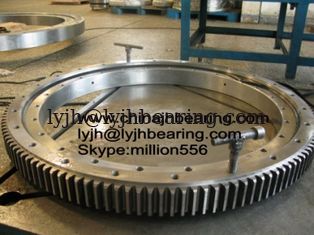 China 061.25.1120.301.11.1523 four point contact ball slewing bearing with external gear ,1013X1278X79mm supplier