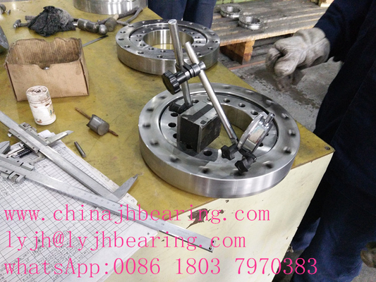 China slewing Bearing factory offer 013.32.1405 four point contact ball slewing bearing,15253X1235X119mm supplier