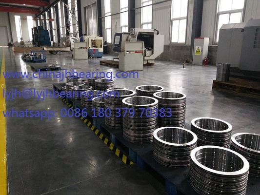 RKS.060.25.1204  China factory four point contact ball slewing bearing,1119x1289x68mm, without gear,JBT10471 standard supplier