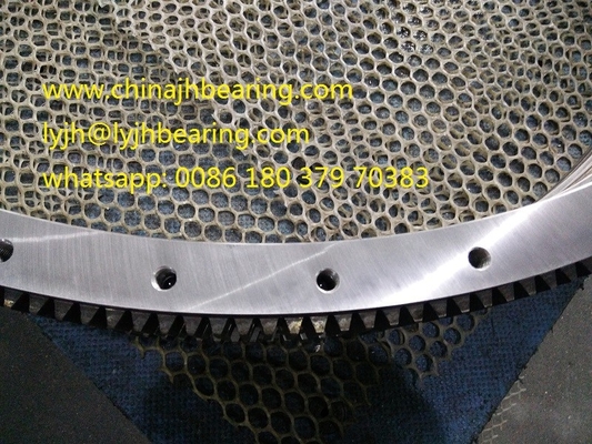 RKS.060.25.1204  China factory four point contact ball slewing bearing,1119x1289x68mm, without gear,JBT10471 standard supplier